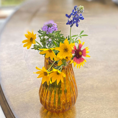 These vibrant one of a kind hand blown vases capture harmonious colors that reflect the local Texas wildflowers.