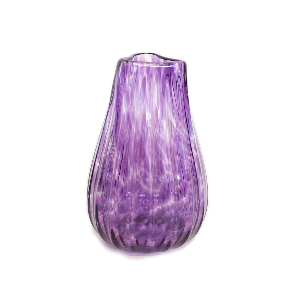 These vibrant one of a kind hand blown vases capture harmonious colors that reflect the local Texas wildflowers.