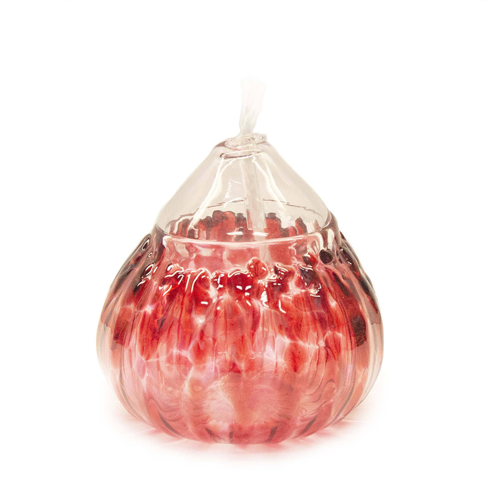 These Wimberley Glassworks signature hand blown liquid candles illuminate variations of hues to enhance the ambiance of a space.